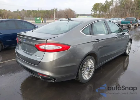 2014 Ford Fusion Titanium z USA, uszkodzony, nr VIN 3FA6P0D96ER281443